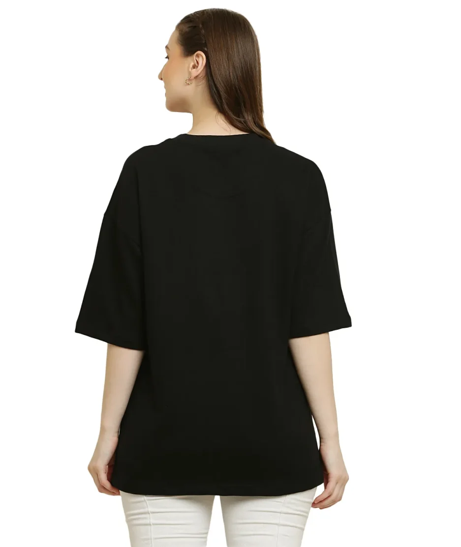 back view of black oversize t-shirt worn by female model