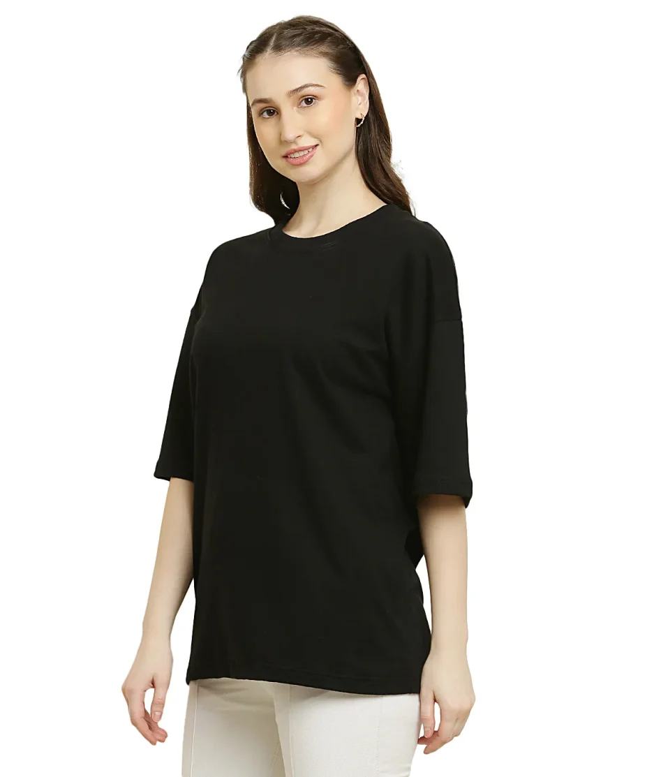 side look of black oversize t-shirt worn by female model