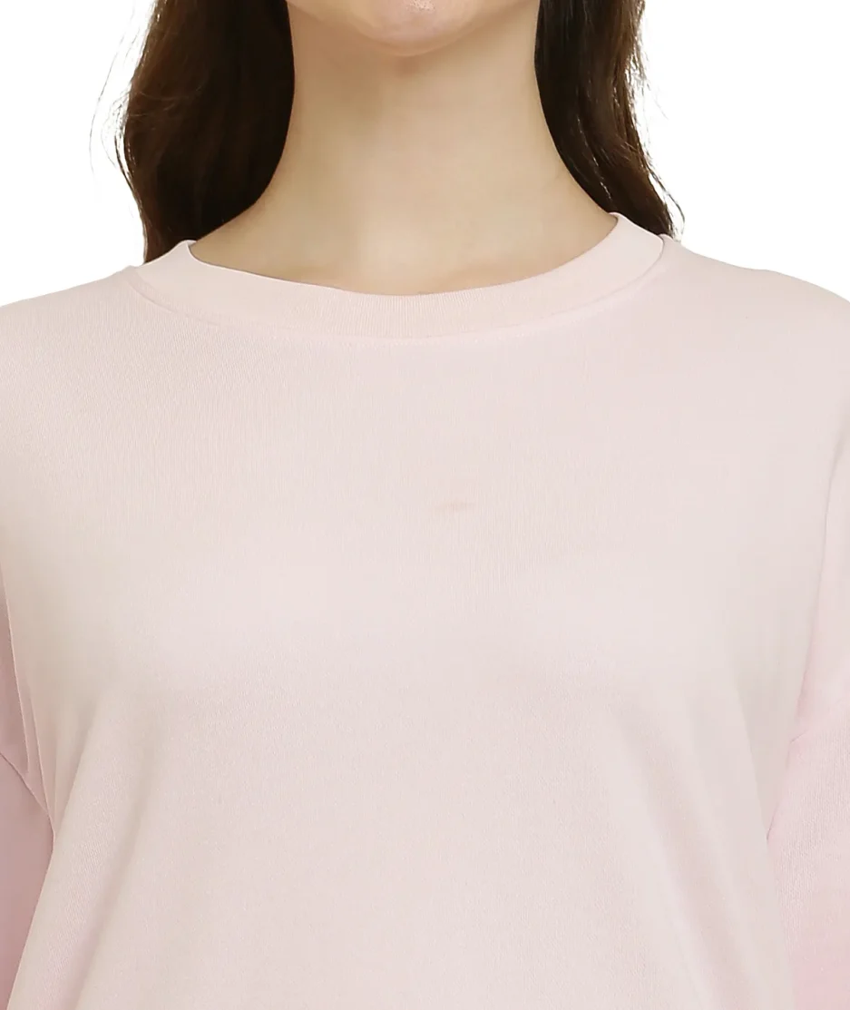 front closeup look of Baby Pink oversize t-shirt worn by female model