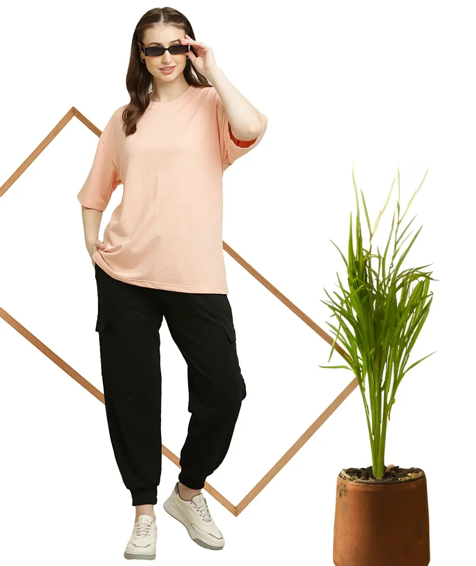 front view of peach oversize t-shirt worn by female model