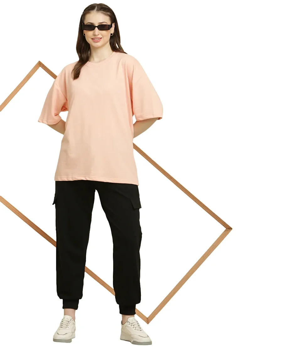 front view of peach oversize t-shirt worn by female model